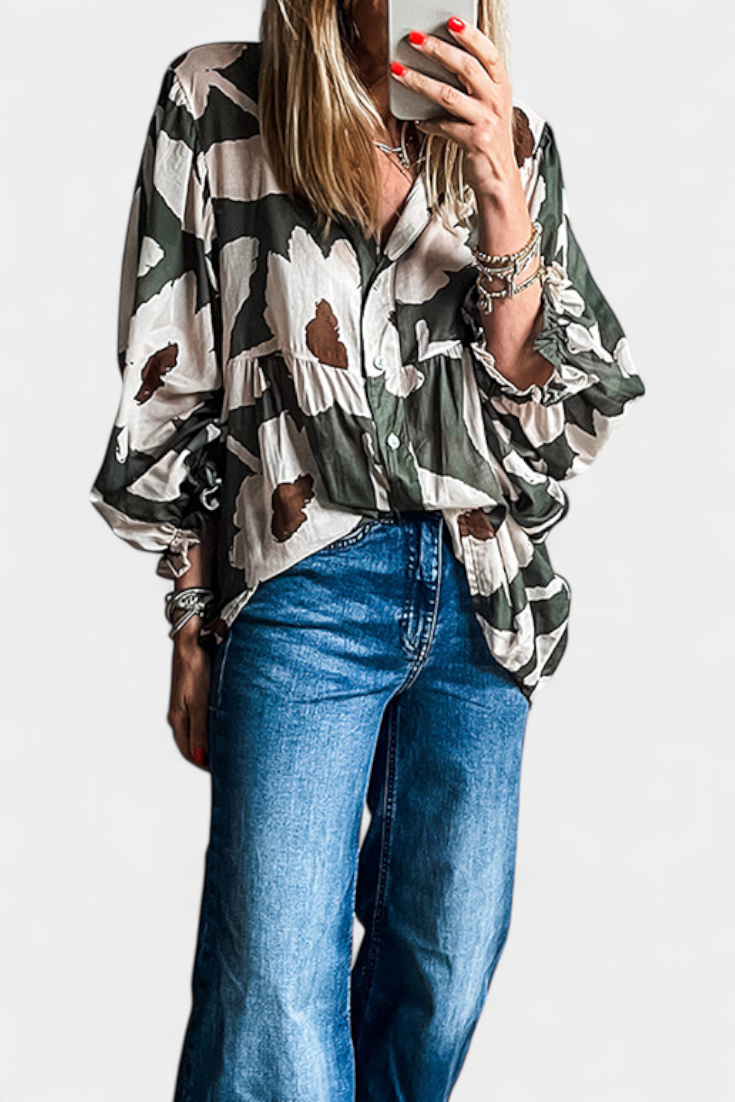 Filomena - Blusa con Manga Abullonada en Estampado Floral Abstracto