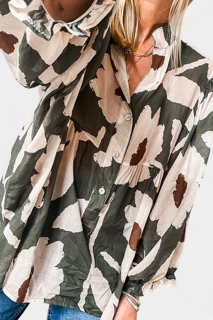 Filomena - Blusa con Manga Abullonada en Estampado Floral Abstracto